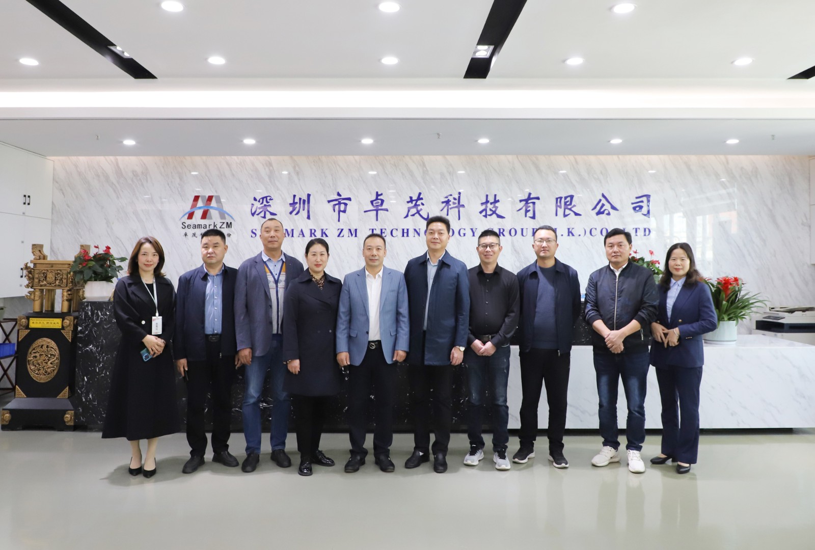 聞總與湖北省?？悼h政府副縣長龔夫一行合影.jpg